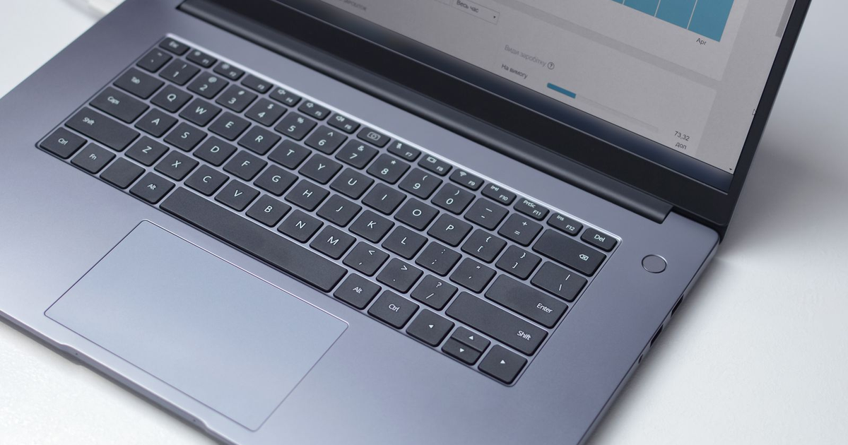 MVP checklist for business, analytics dashboard on a laptop