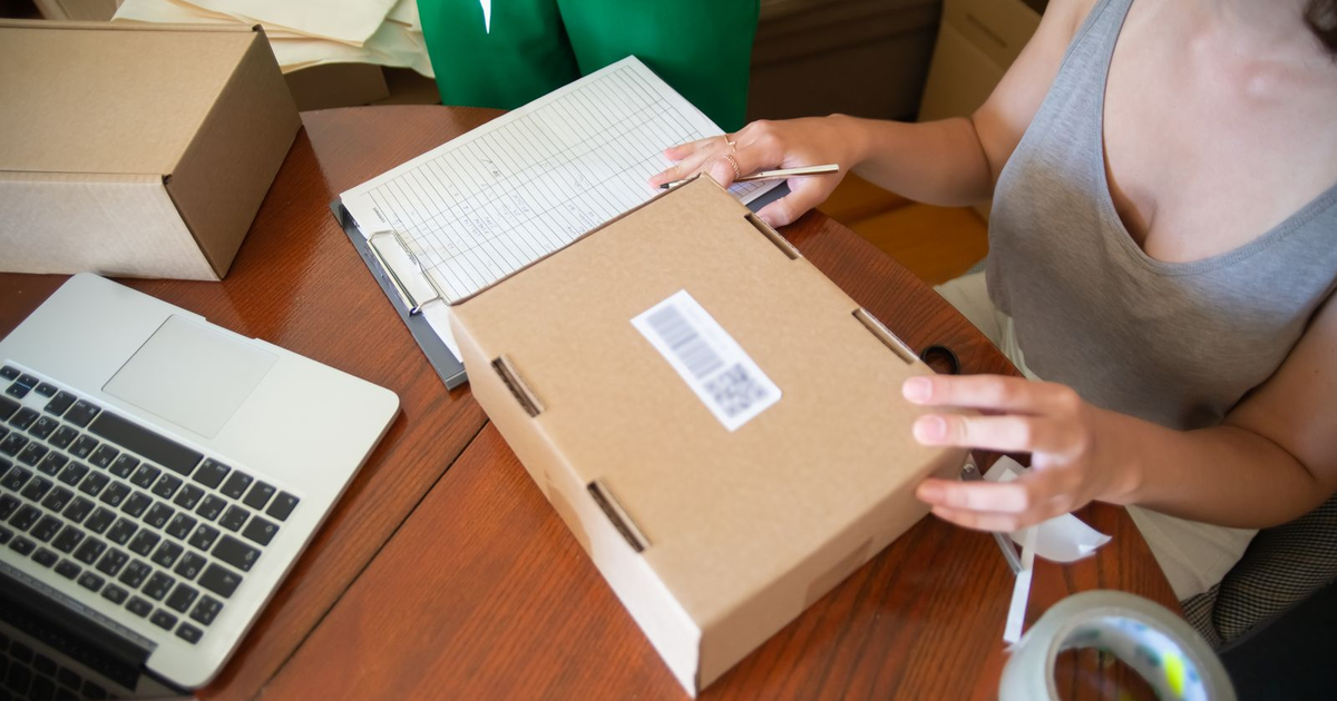 small store team packing online orders for shipping