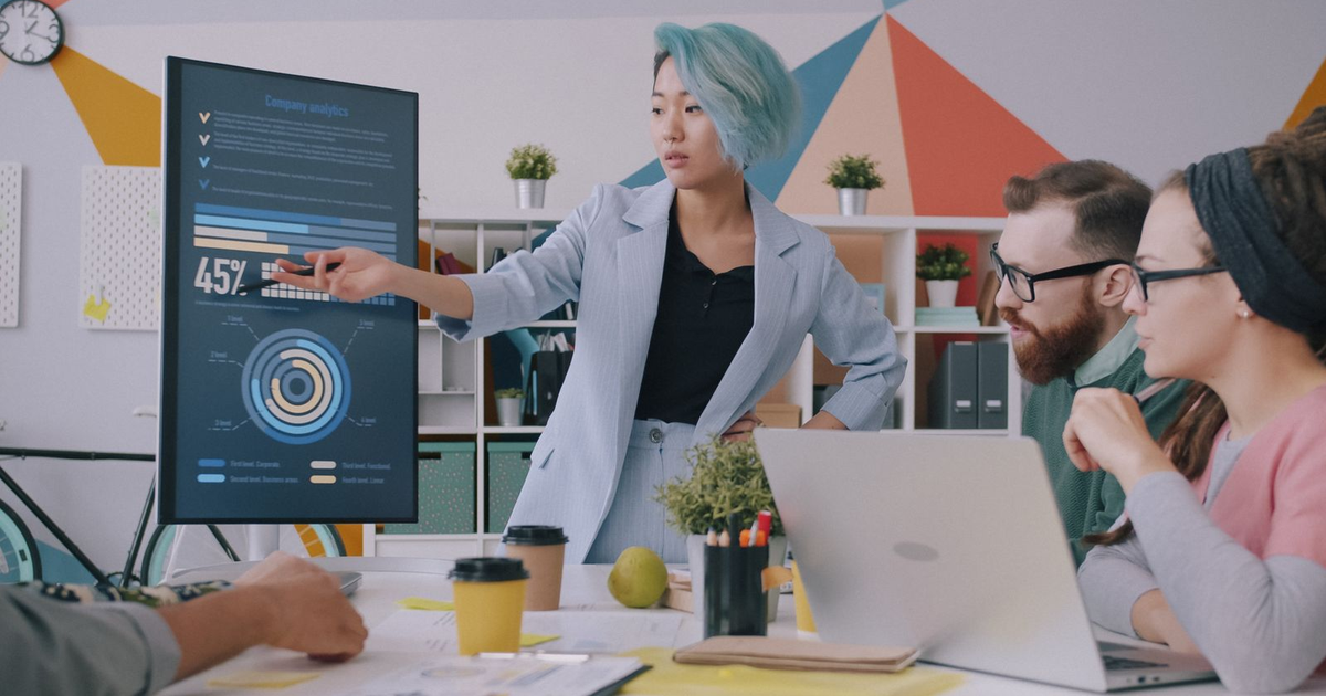executive comparing a custom CRM vs off the shelf options with a developer