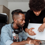 team choosing the best CMS for business website with a developer